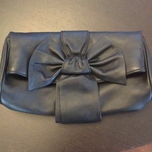 Felix Rey bow front flap clutch